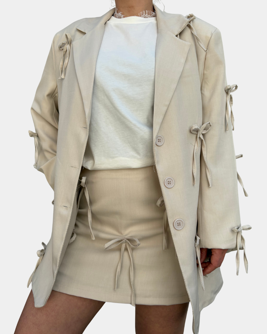 Completo fiocchi beige