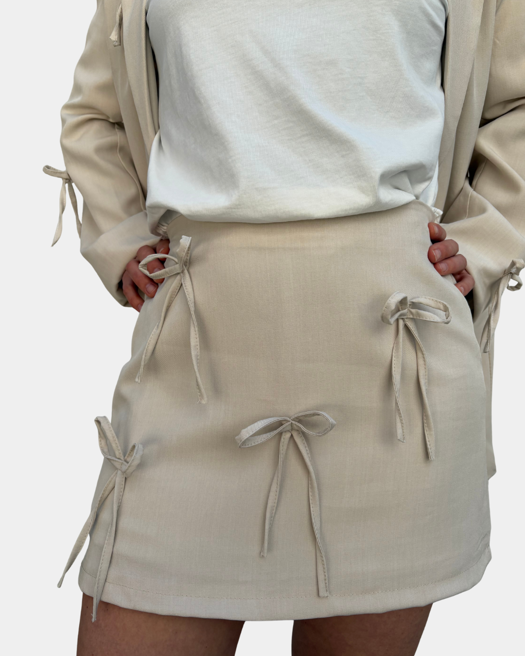 Completo fiocchi beige
